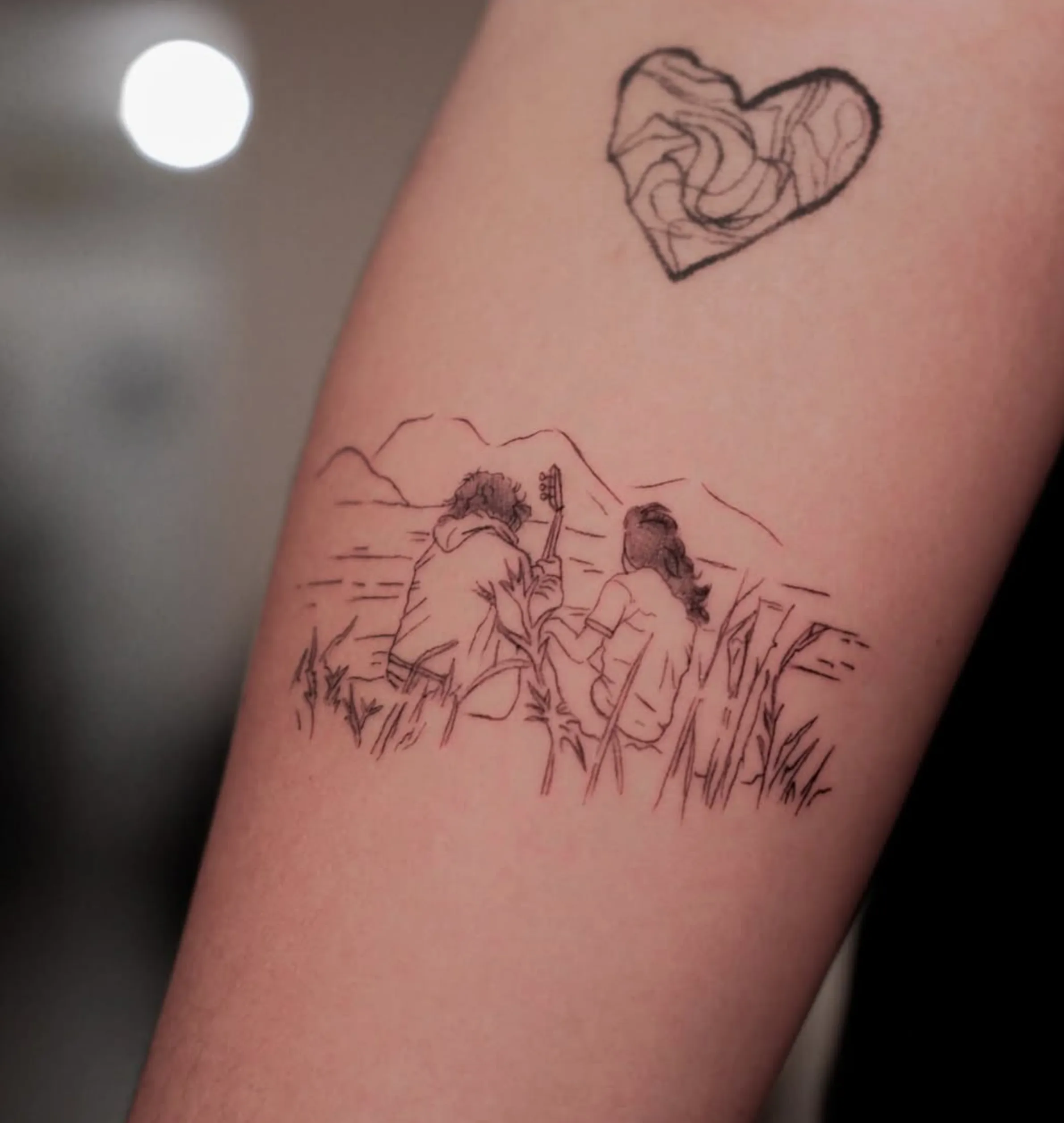 fine line tattoo touch up